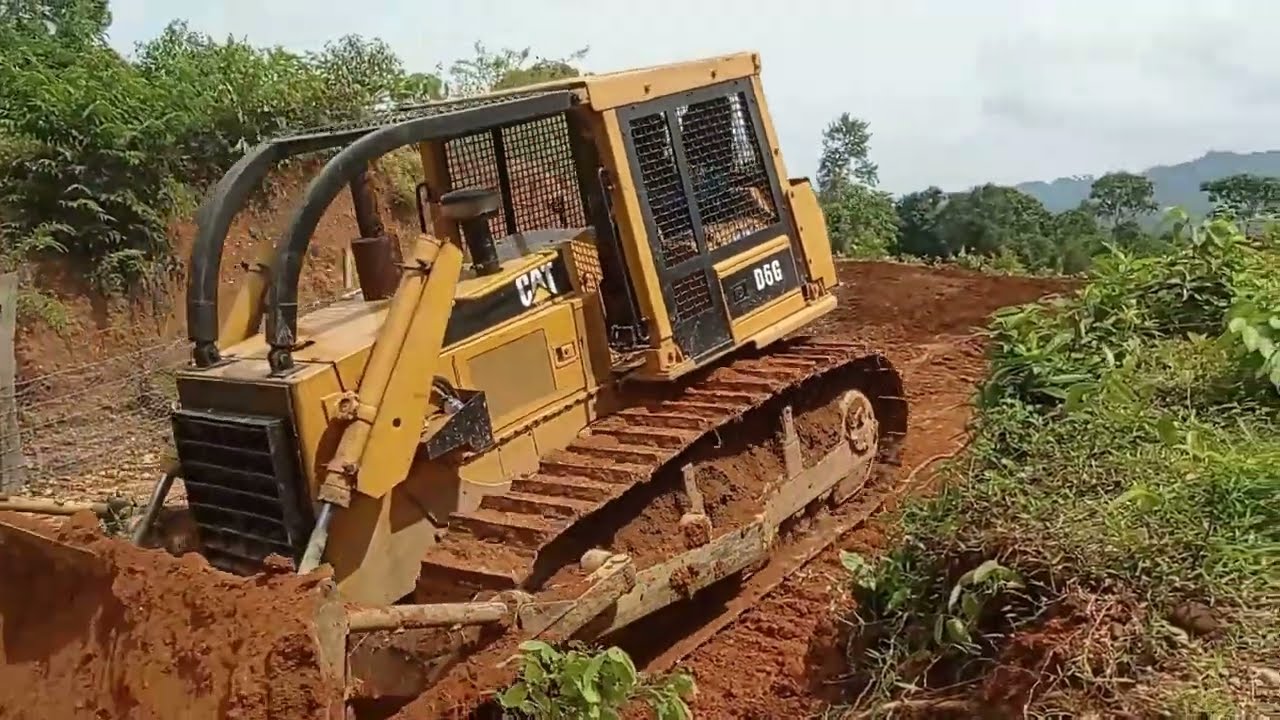Good work!! Cat D6G Bulldozer At Work Expands Wide Road
