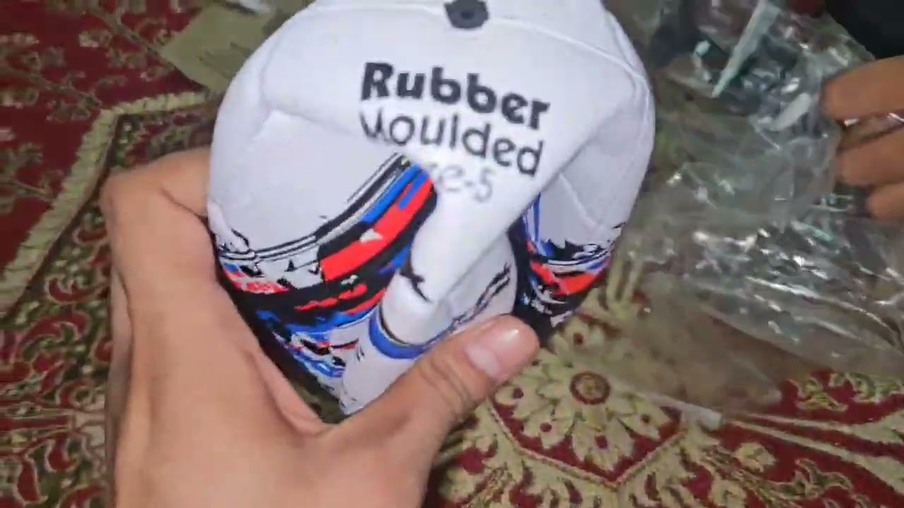 unboxing video of rubber moulded football buy from Amazon