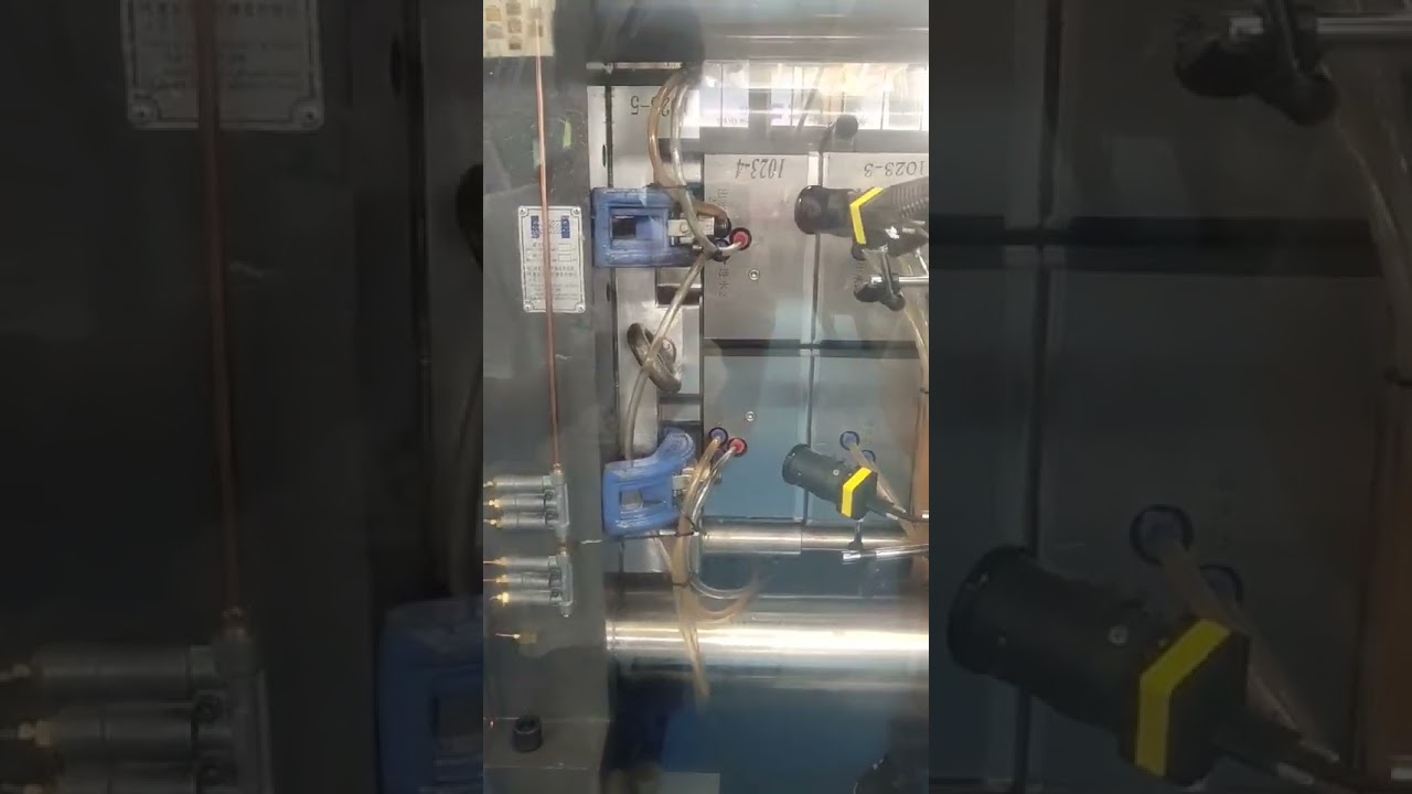 Side-Entry In-Mold Labeling System | NPC Injection Molding Machine
