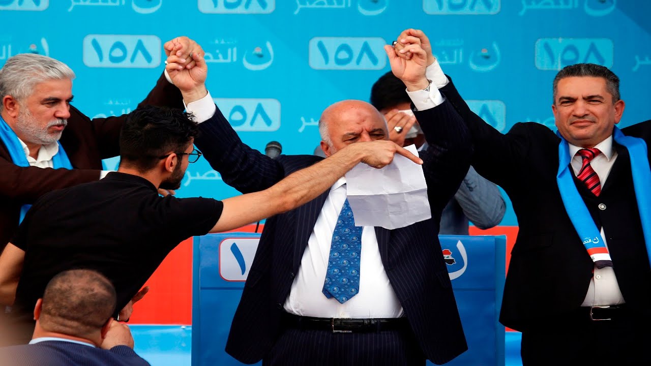 العصابجية الذين كان يديرهم عدنان الزرفي حينما كان محافظاً في النجف بالصوت والصورة
