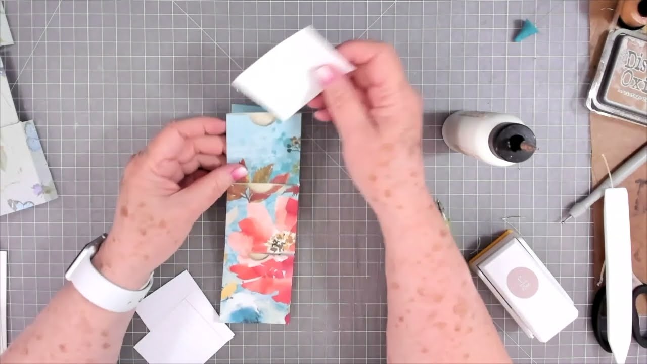 INTERLOCKING STACKED POCKETS WITH  HIDDEN TUCK SPOTS