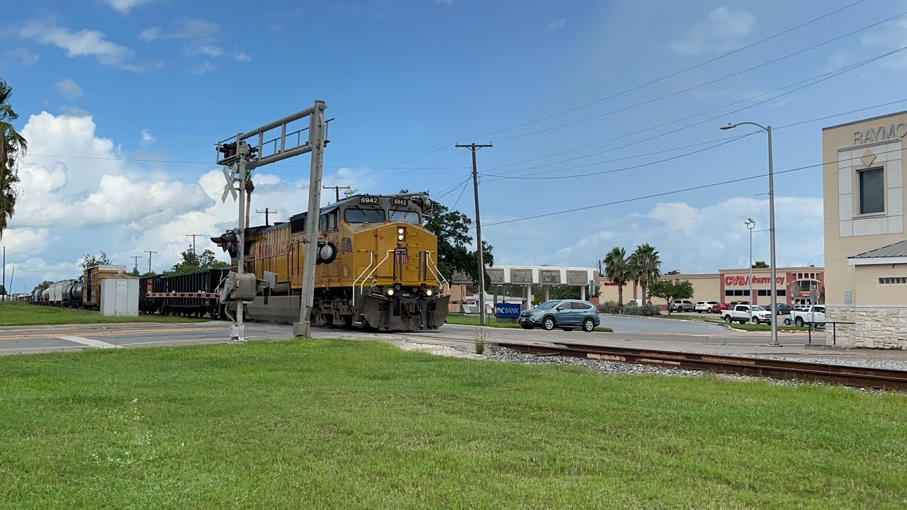 UP 6942 C44CM leads M-EWOL in Raymondville TX.