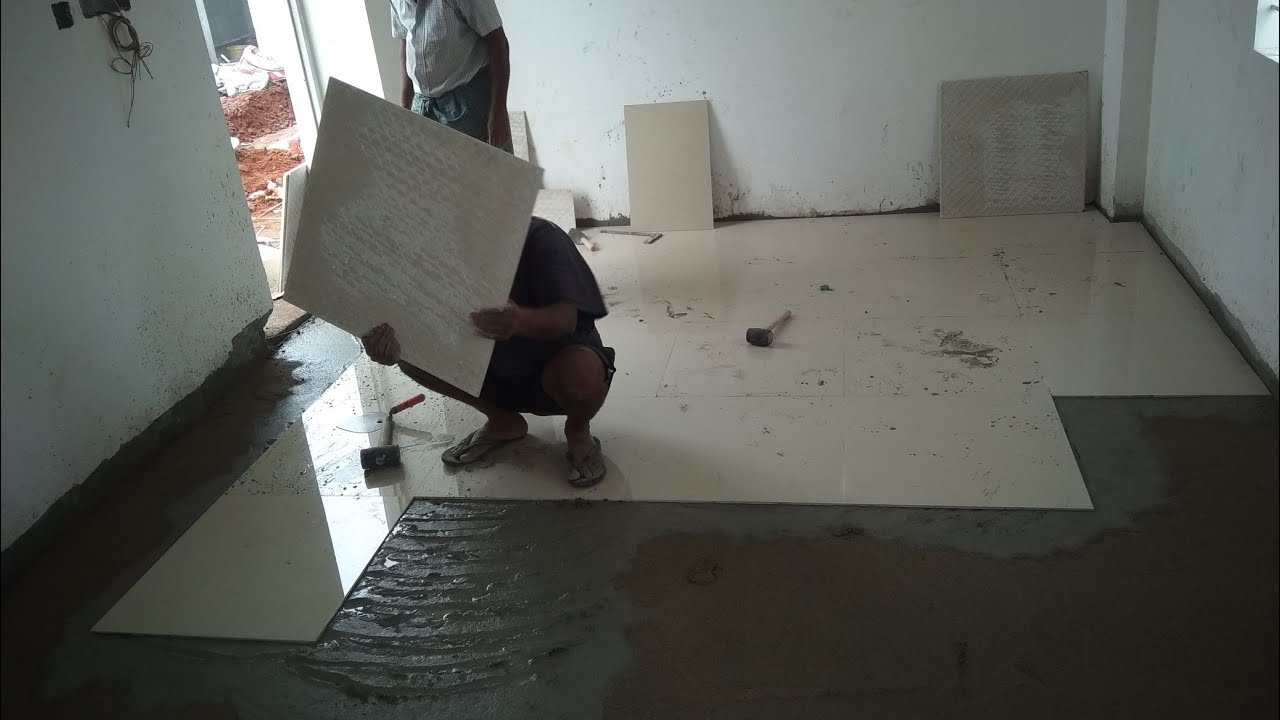 2&times;2 MARBONITE tiles fixing using river sand and cement