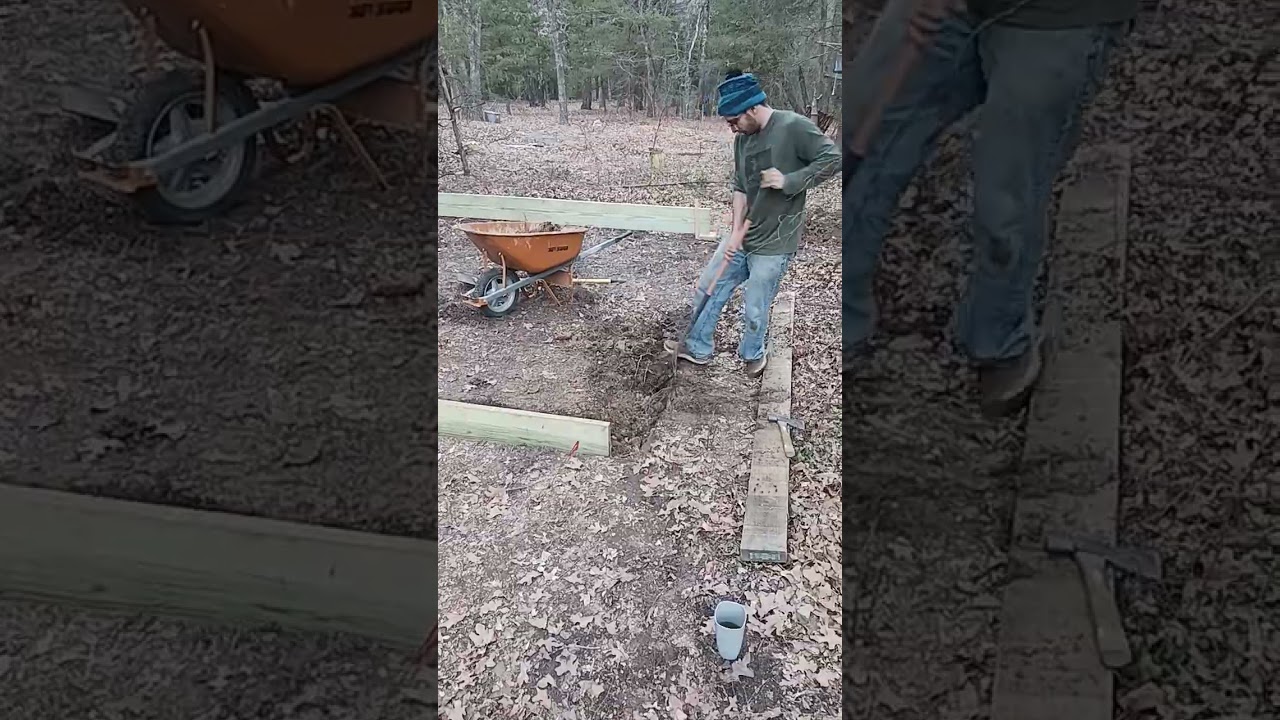 Digging and leveling the foundation frame for a new shed.