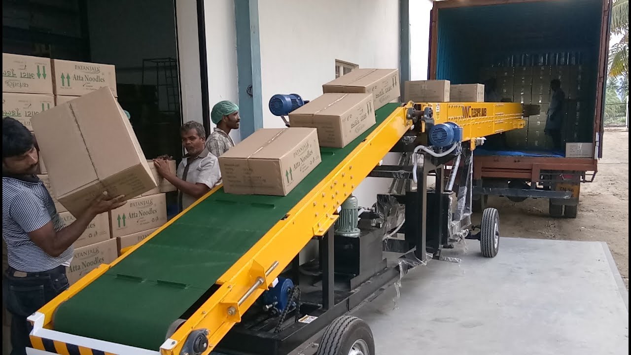 MMC Telescopic Truck Loading Conveyor in Patanjali Atta Noodles Factory