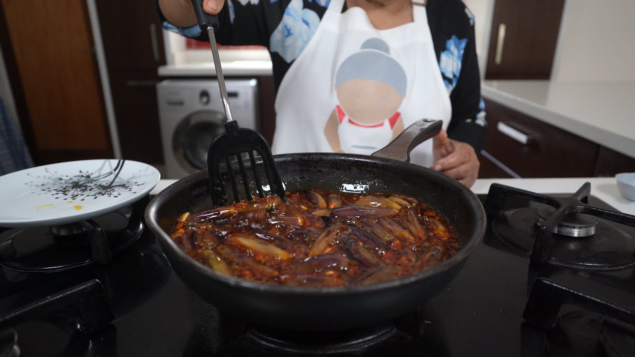Making brinjal pickle - sweet and tangy pickle ready to eat instantly!