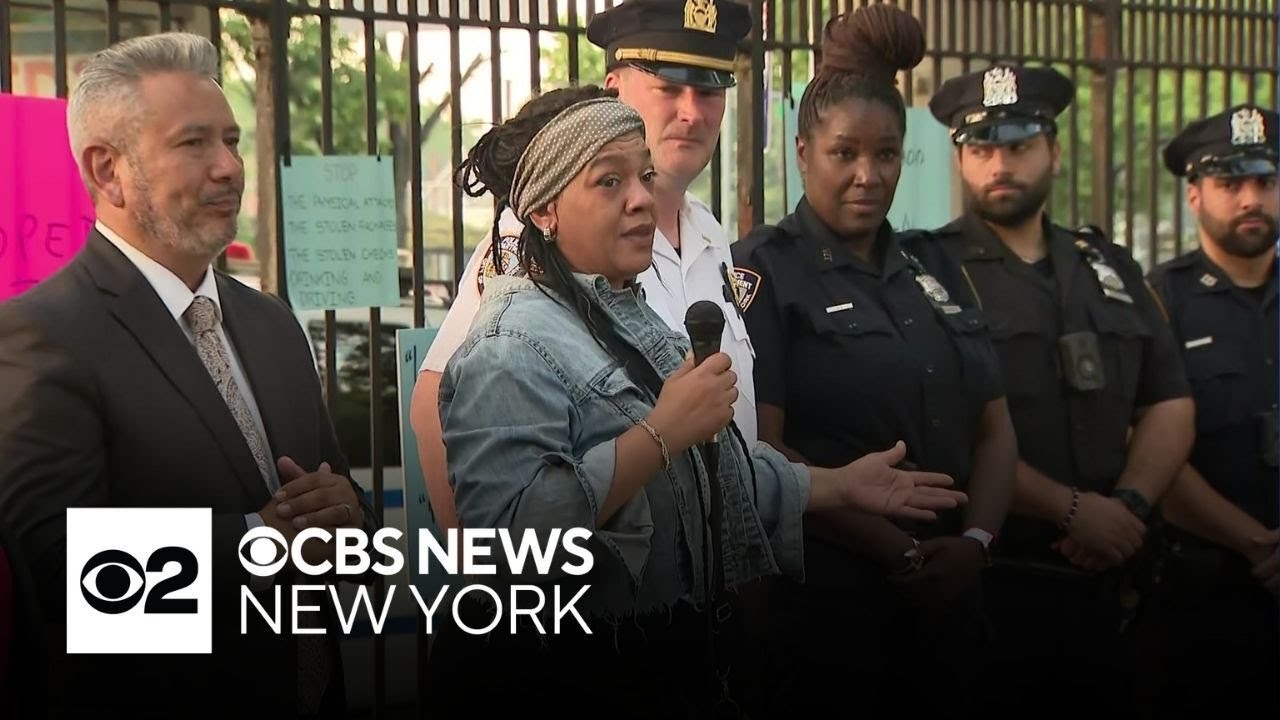 Queens community rallies for change after 2 officers shot