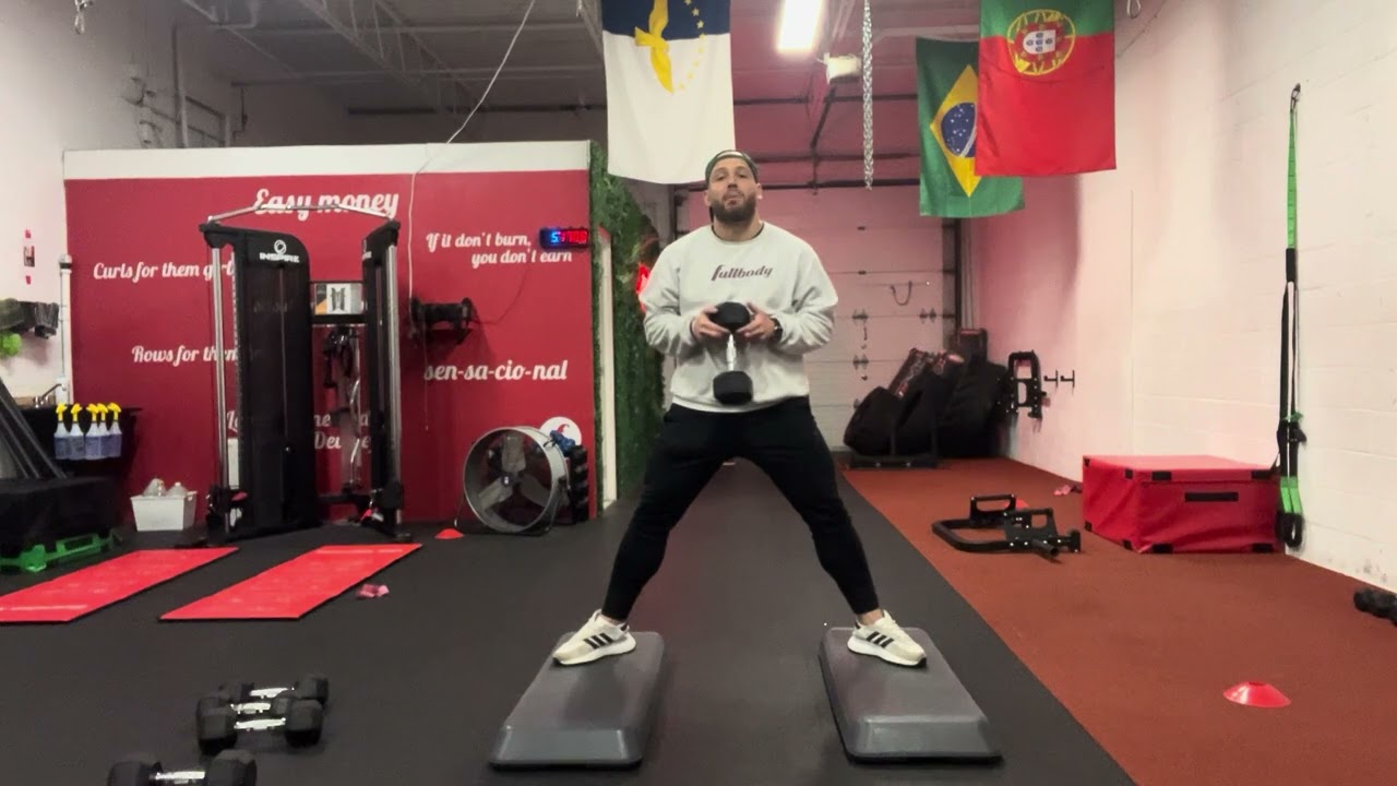 How to do a Elevated Sumo Squat DB