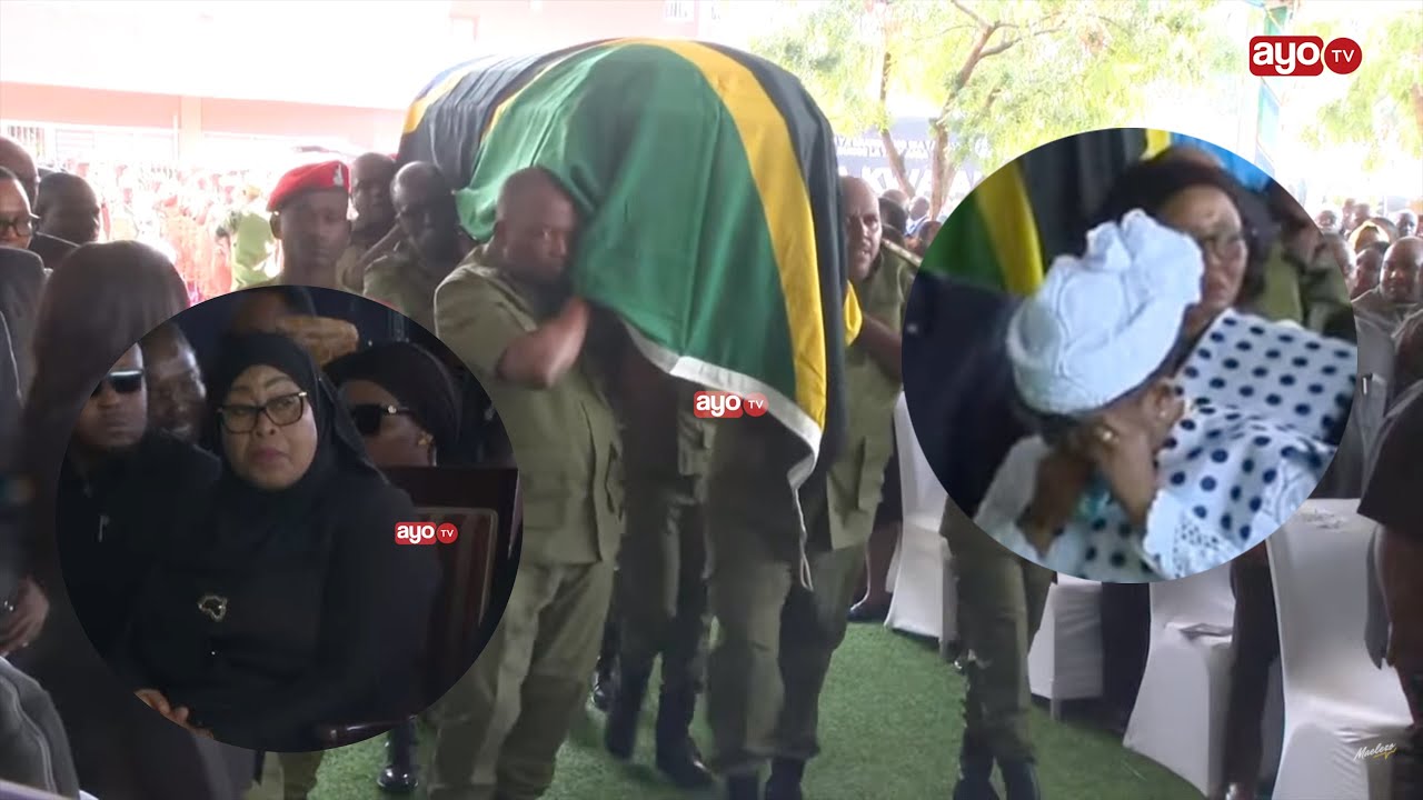 MKE WA NDUGAI AMWAGA MACHOZI MWILI UKIWASILI VIWANJA VYA BUNGE DODOMA