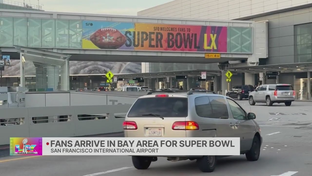 Excited Seahawks fans arrive at SFO for Super Bowl LX
