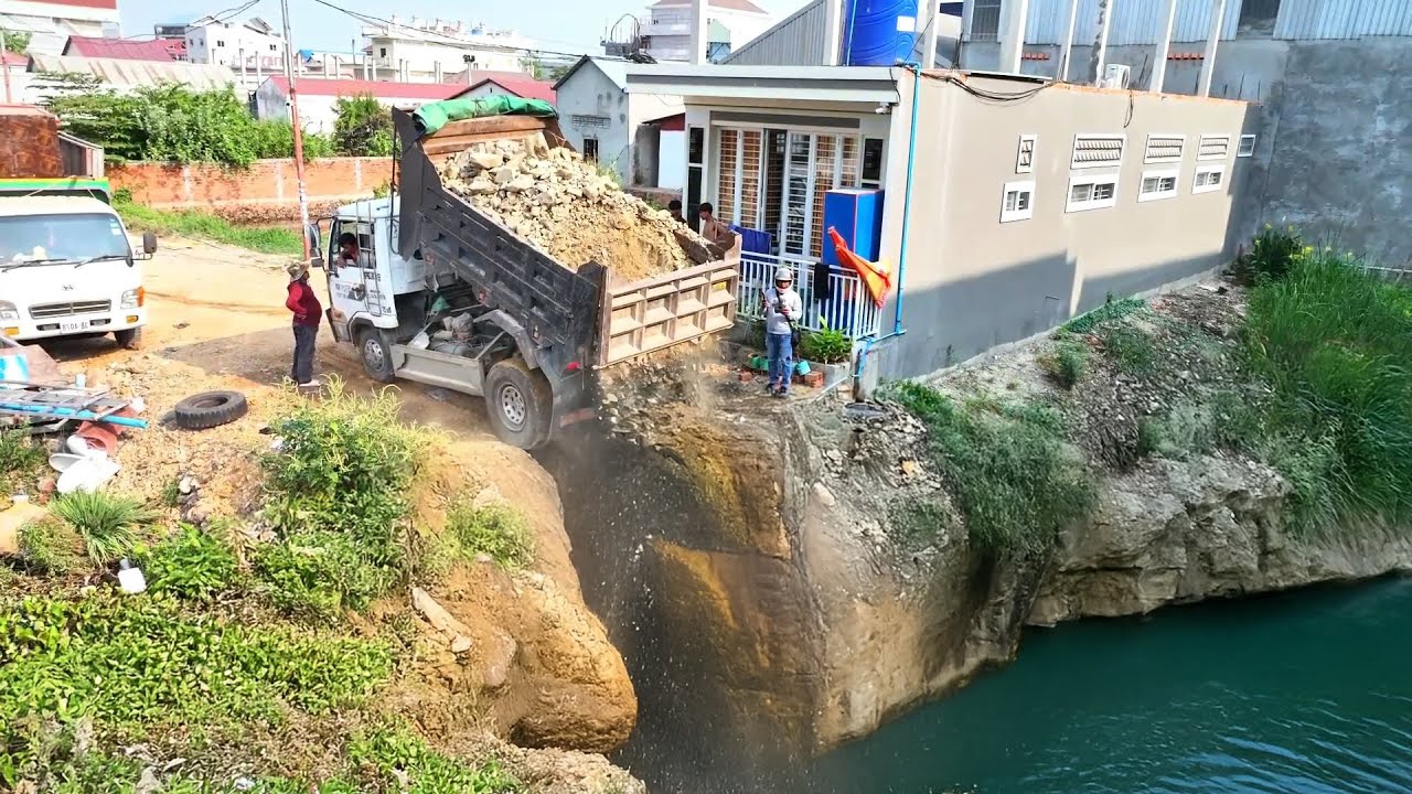 Construction Site Action: Watch a Dump Truck 5ton Deliver Bulk Dirt & Rocks into the Water..?