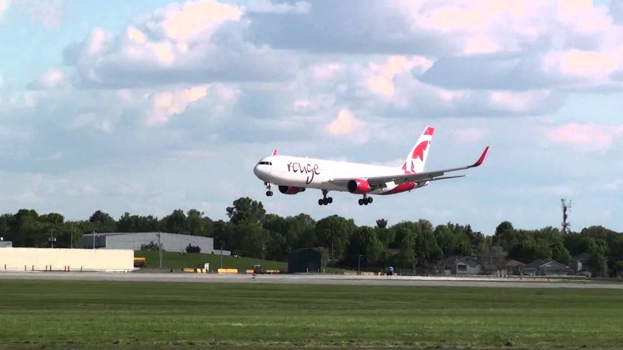 Air Canada Rouge B763 with winglets landing on runway 06L at YUL