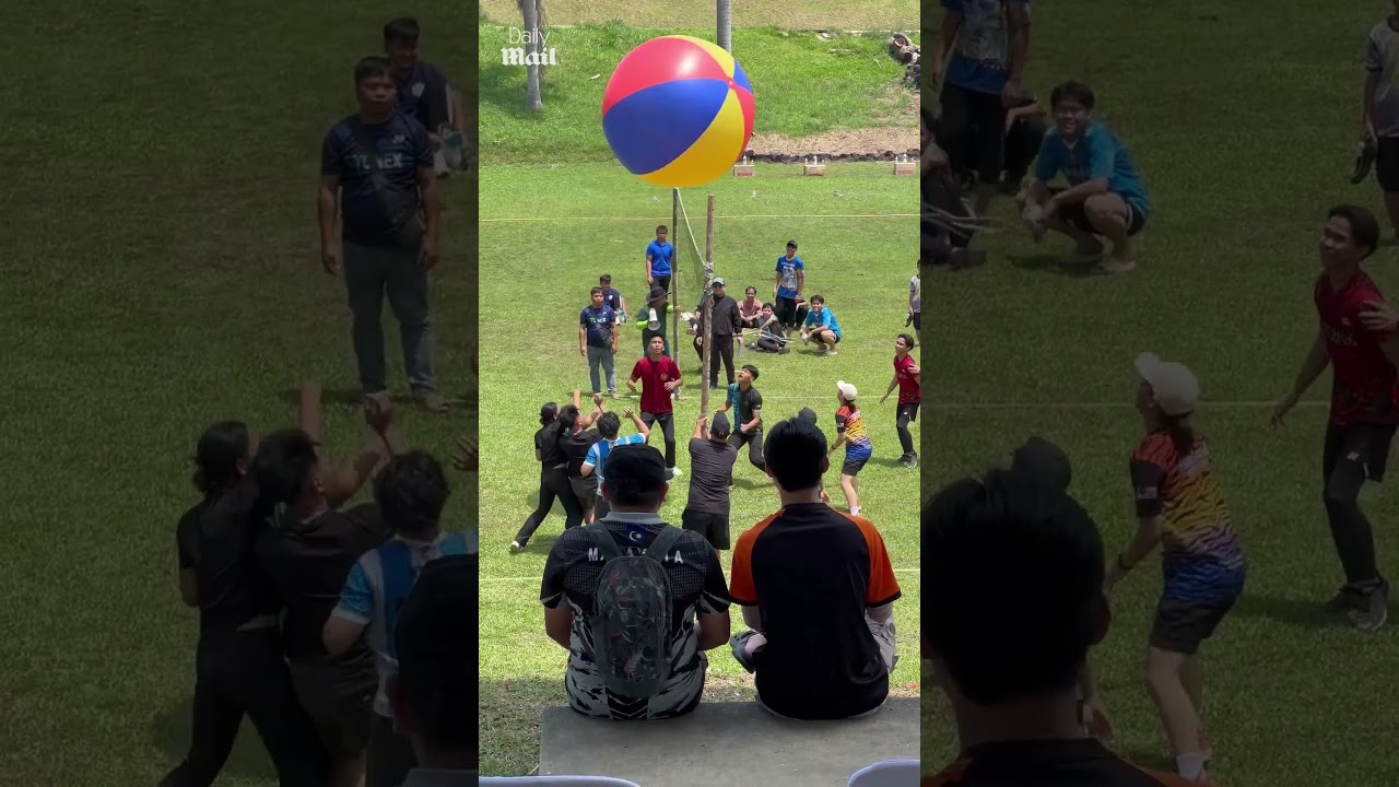 Students play giant volleyball