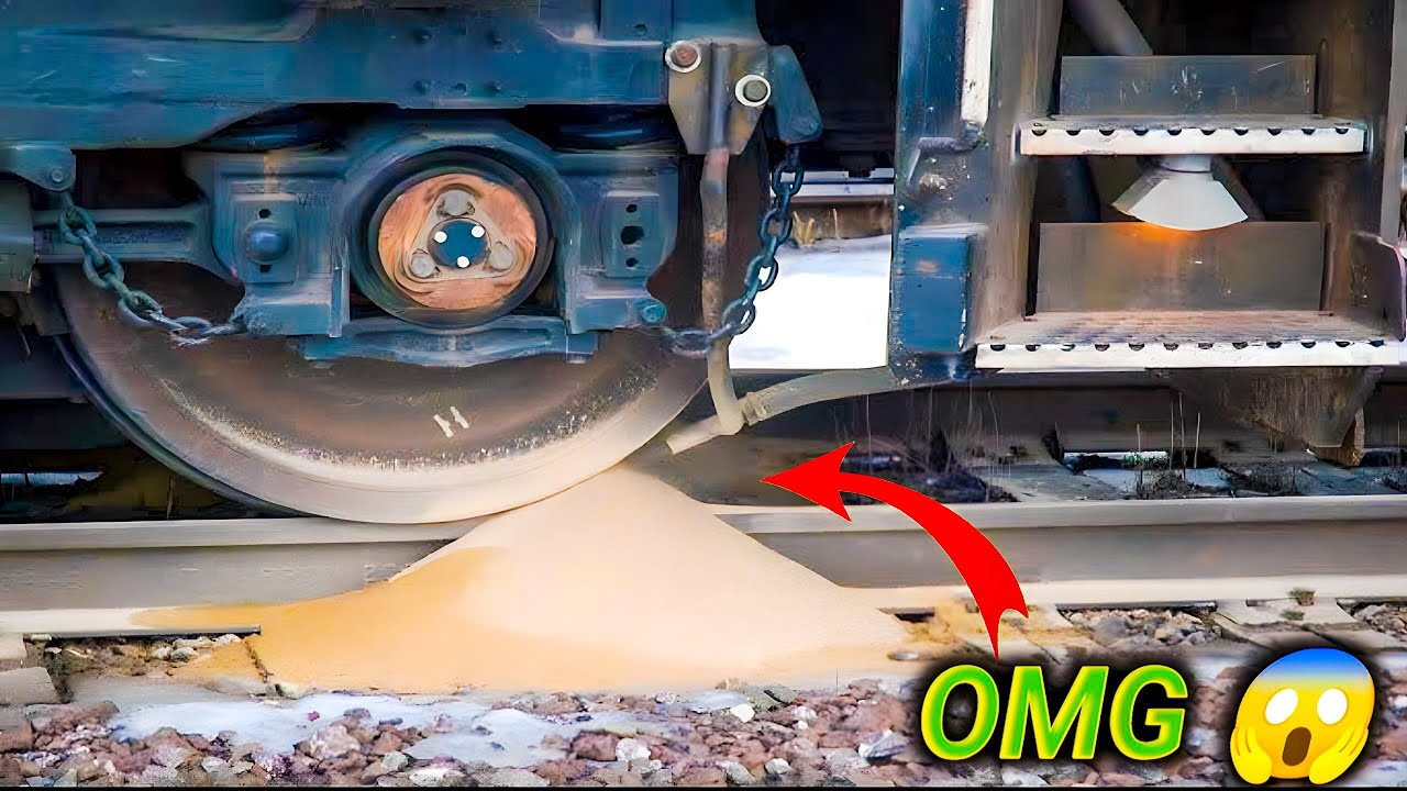 sandbox in train engine.sandbox in locomotive.sand on train wheels.sand on rail track.