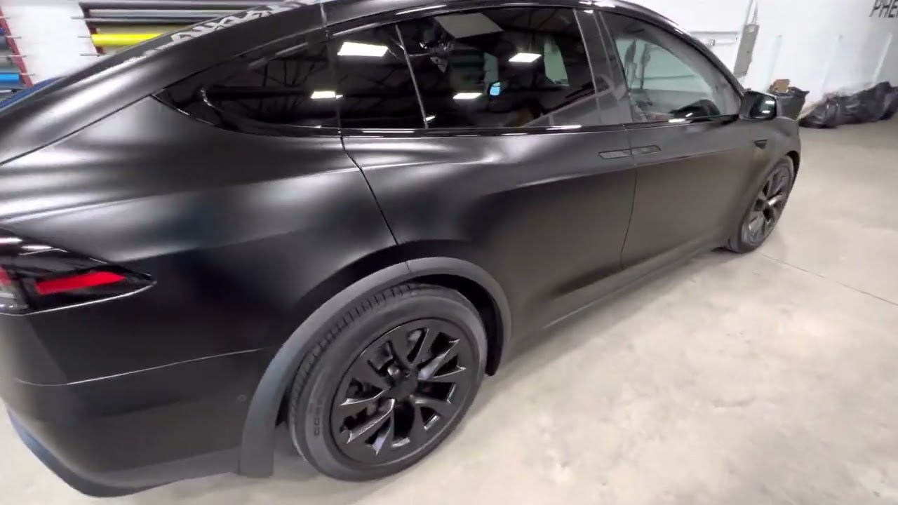 2022 Plaid Model X wrapped in Xpel Stealth on Gloss Black.