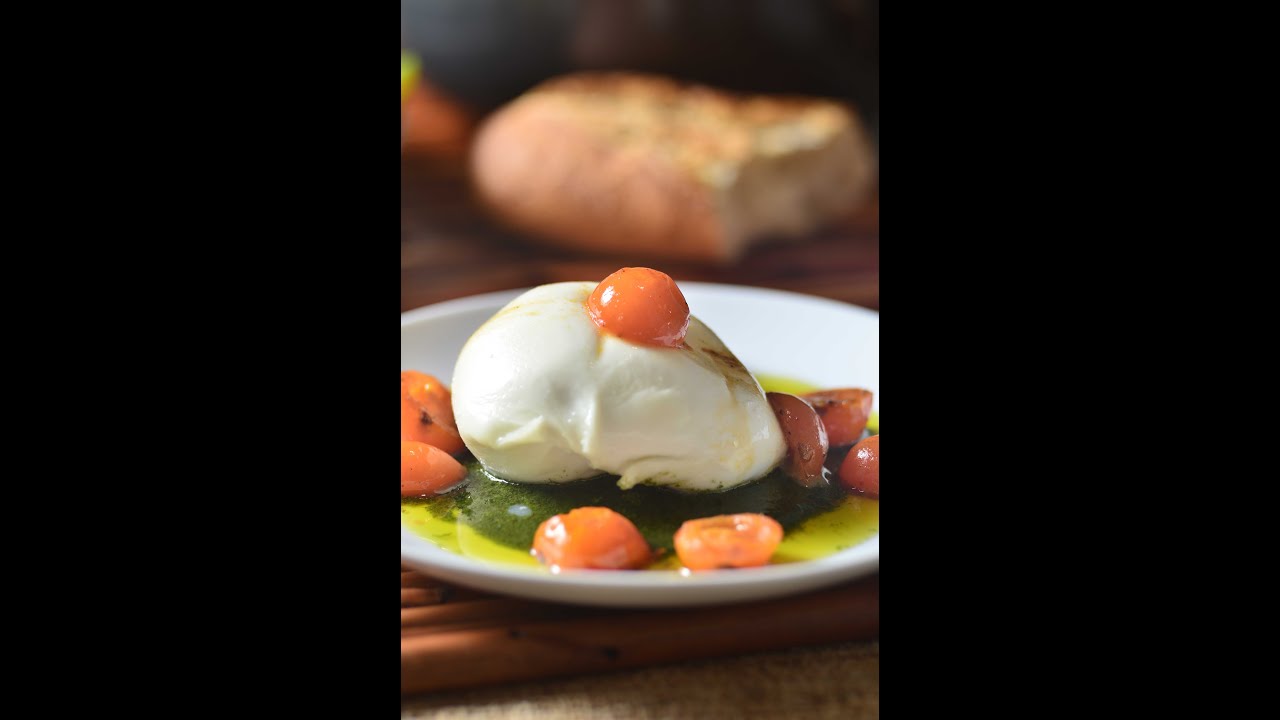 Burrata with basil pesto and roasted tomatoes