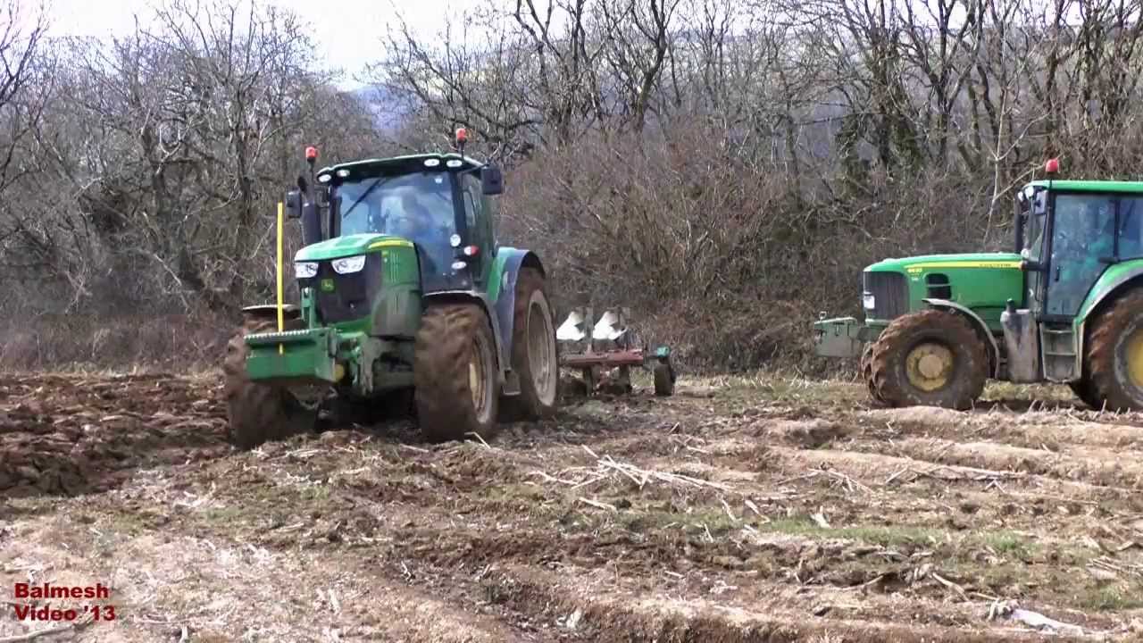 Ploughing with John Deere 6210R and 6930.