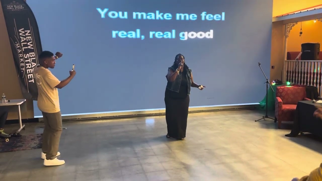 Tasha Johnson singing at 