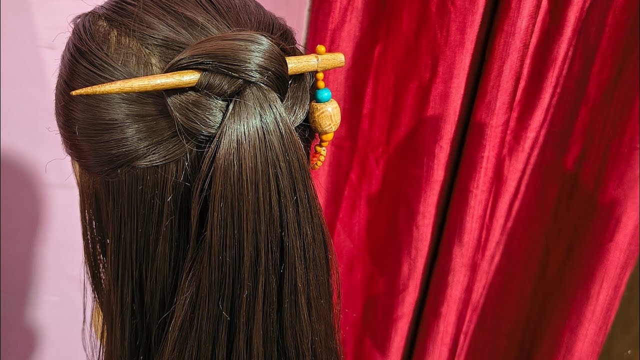 Open Hairstyle With Stick...