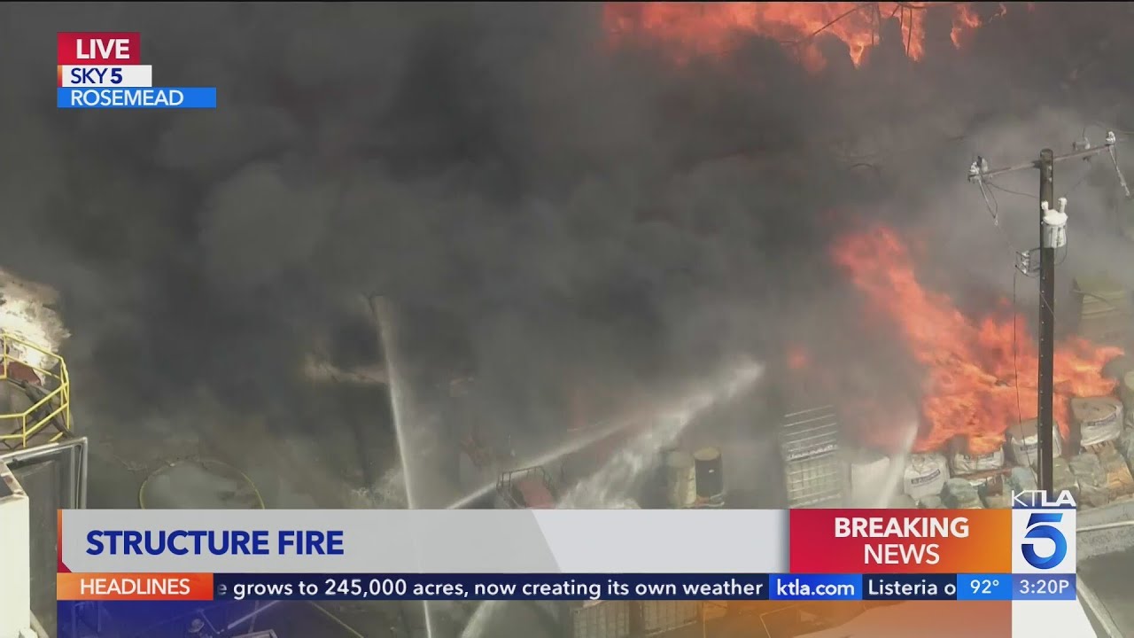 Massive structure fire erupts east of Los Angeles