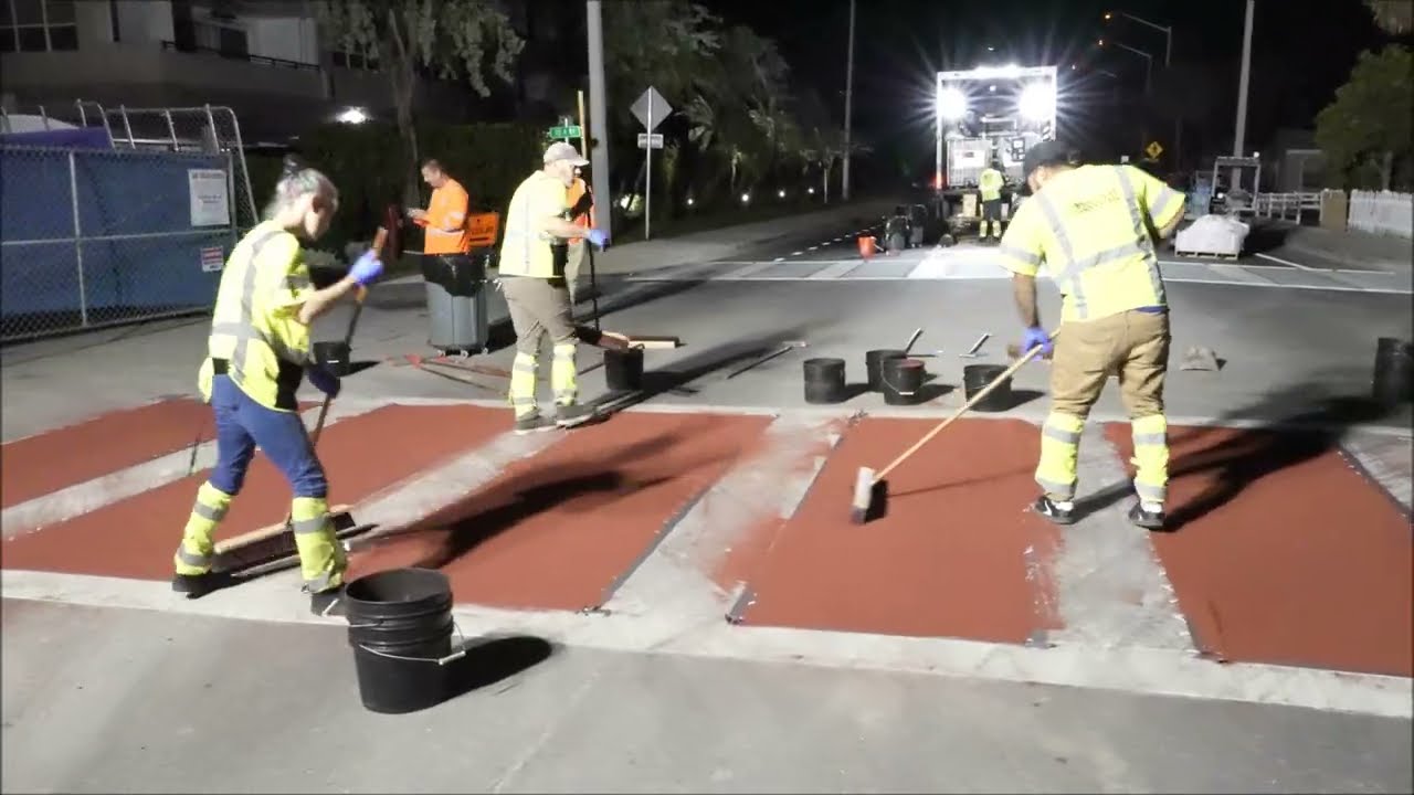 Crosswalk construction by night is poetry in motion in Pompano Beach