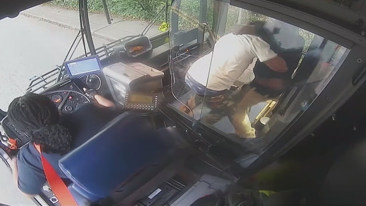 Surveillance video shows fight between city bus passenger, off-duty CATS guard | WSOC-TV