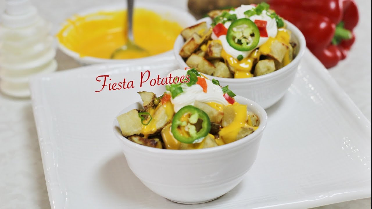 Fabulous Fiesta Potatoes Video Recipe by Bhavna - Cheesy Baked Potatoes
