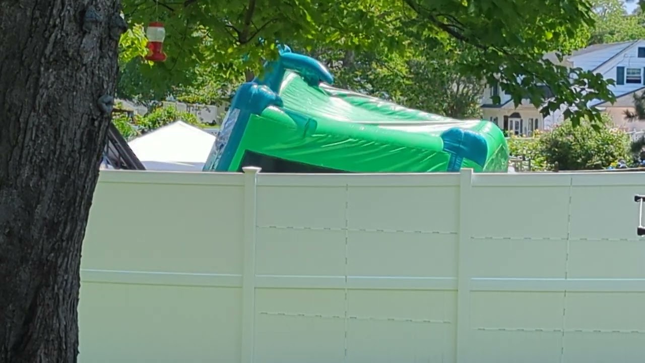 rocking the bounce house in the yard