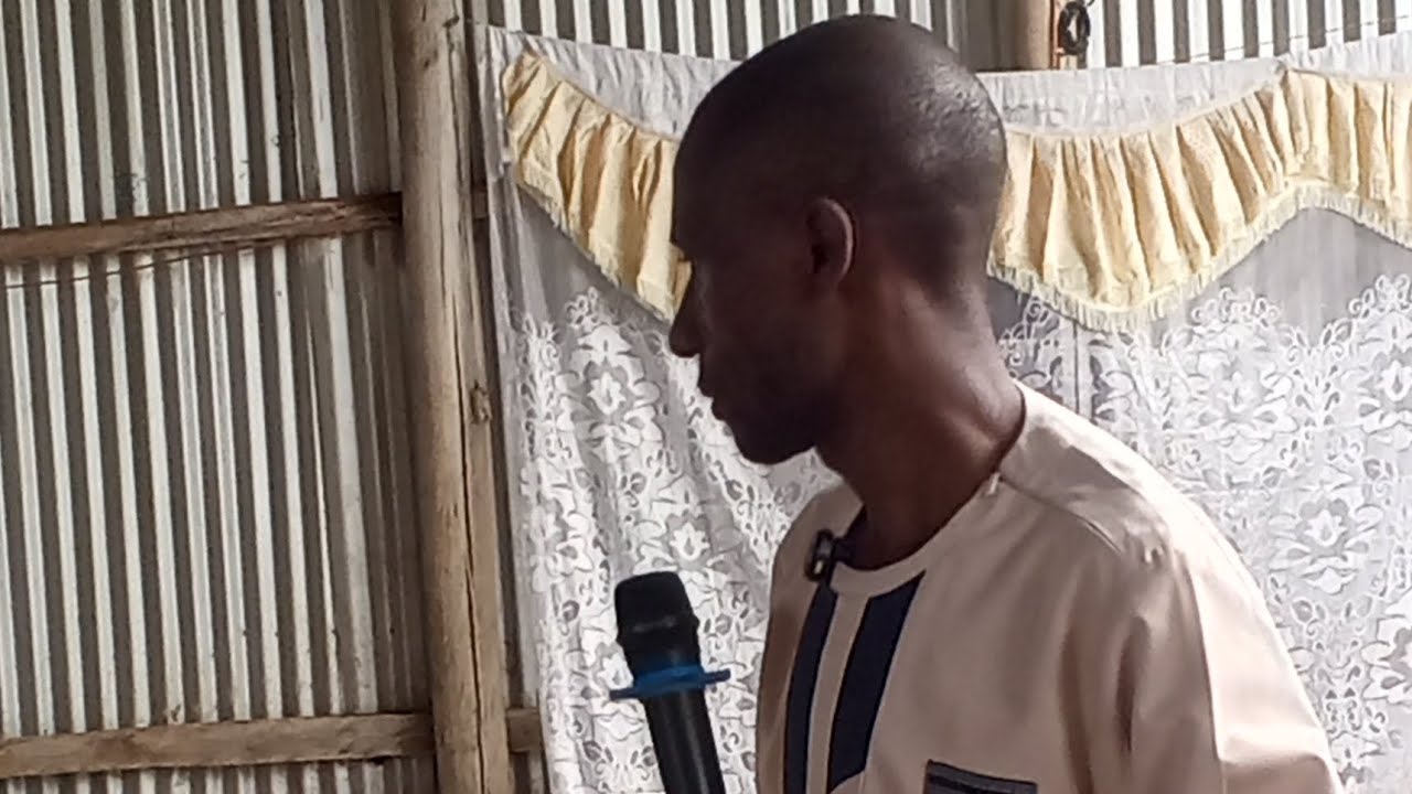 Apostle Reuben is speaking the old woman who will have a dedicated ceremony at New Jerusalem tent 