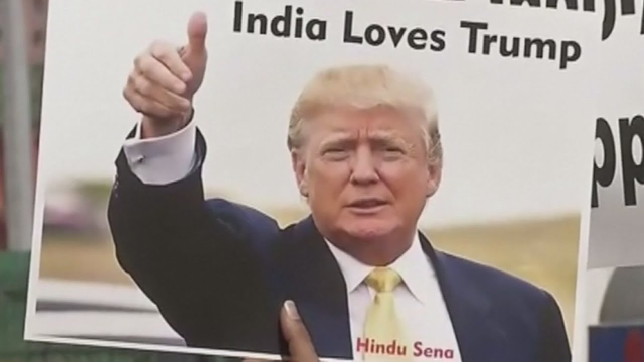 'He is our hero': Protestors burn Hillary Clinton posters at pro-Donald Trump rally