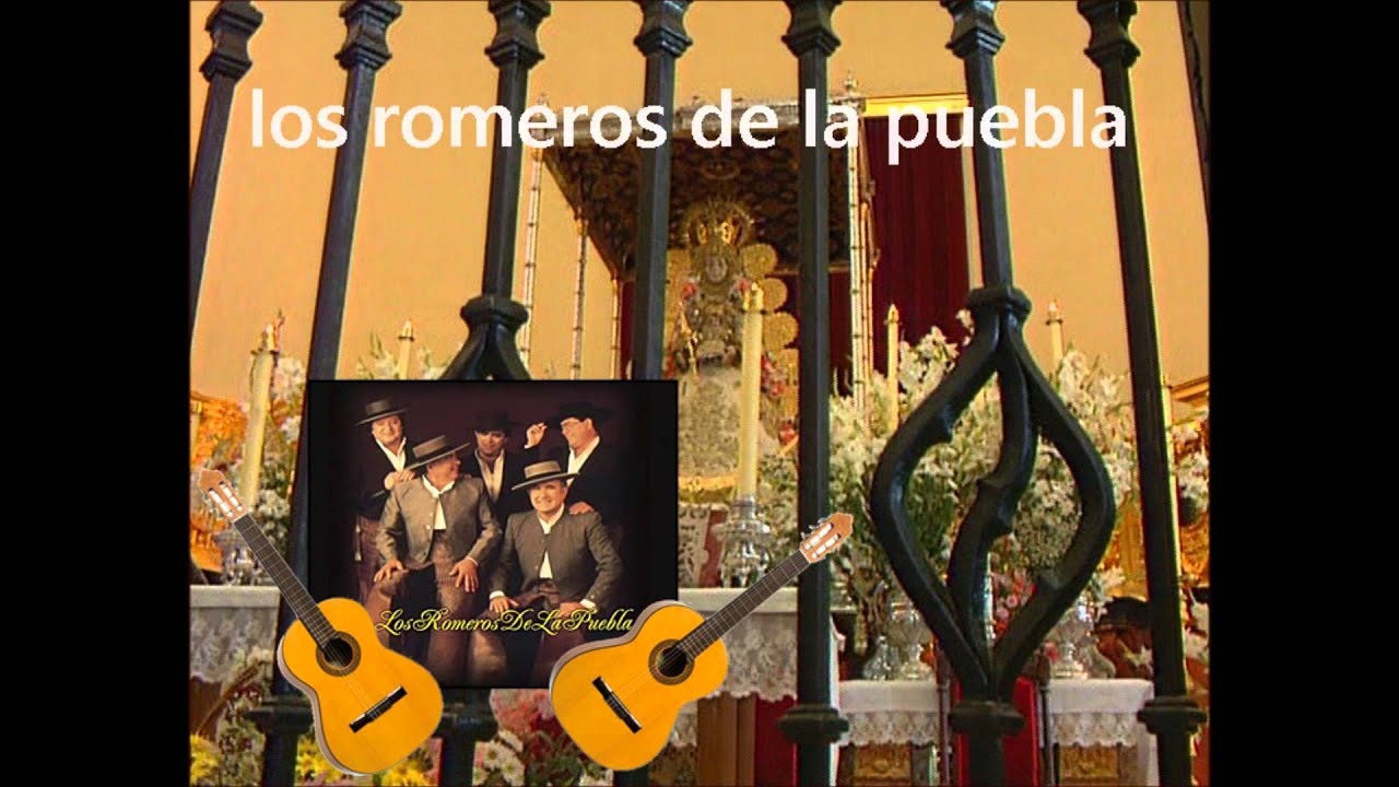 LOS ROMEROS DE LA PUEBLA en la penumbra del templo