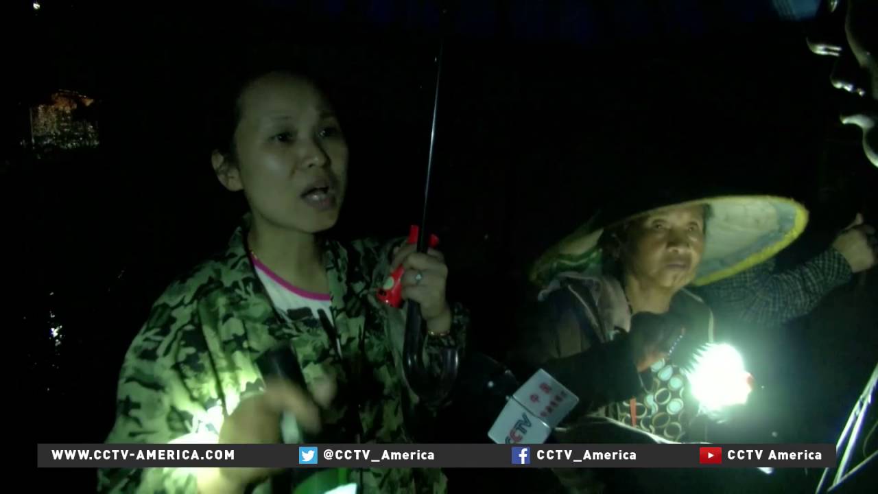 Tens of thousands evacuated from heavily flooded villages in Wuhan
