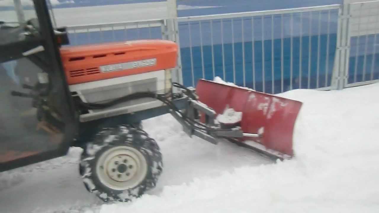 Odśnieżanie Warszawa.Traktor komunalny Kubota 1600 odśnieżanie. www.akant-ogrody.pl
