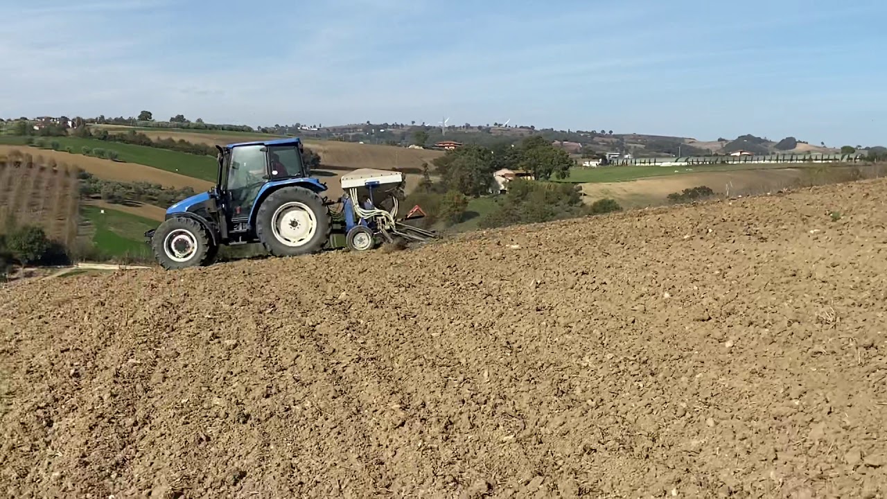 New Holland TL100 in semina con VERTULLI vsp 429