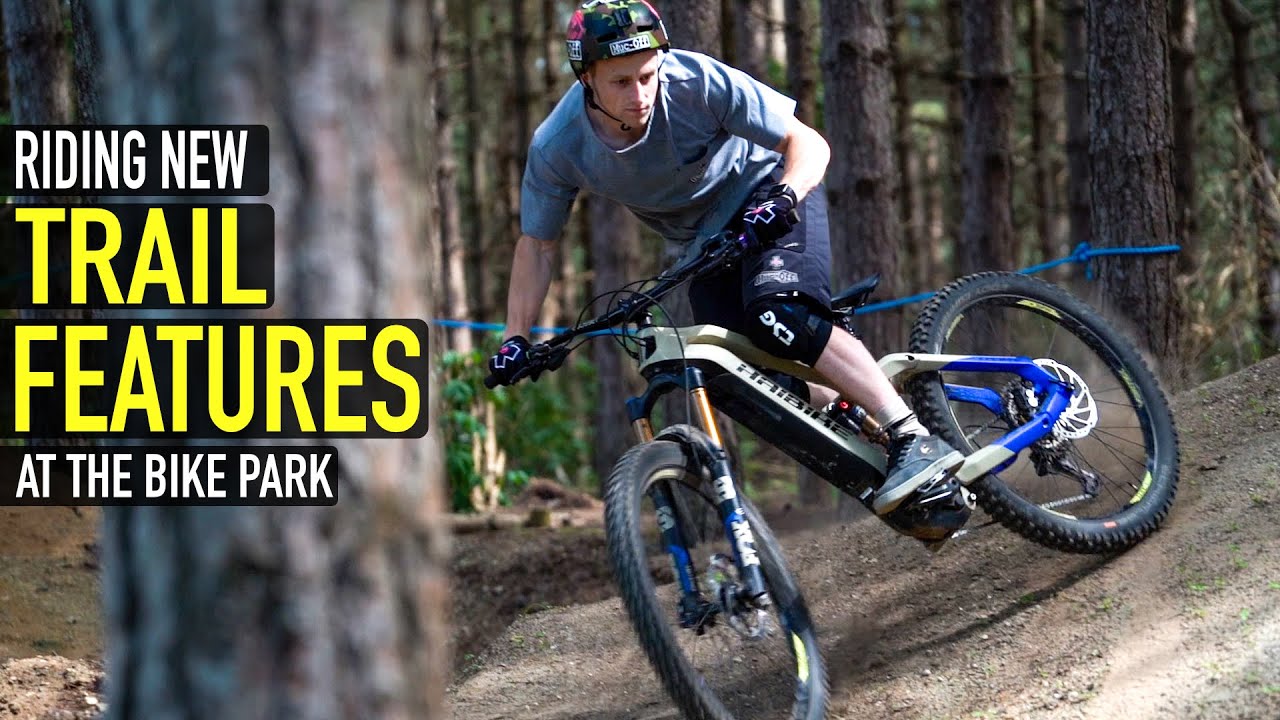 RIDING NEW TRAIL FEATURES IN A BIKE PARK!