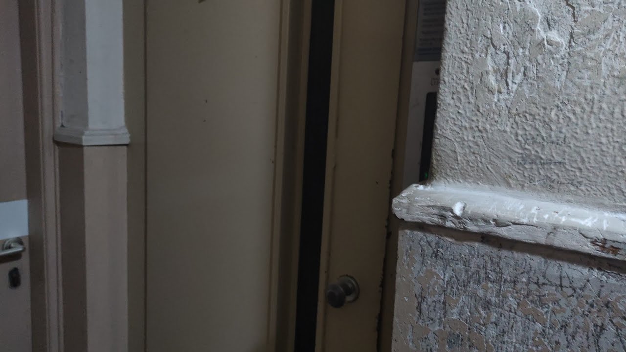 Old single-speed traction elevator in multi-storey house