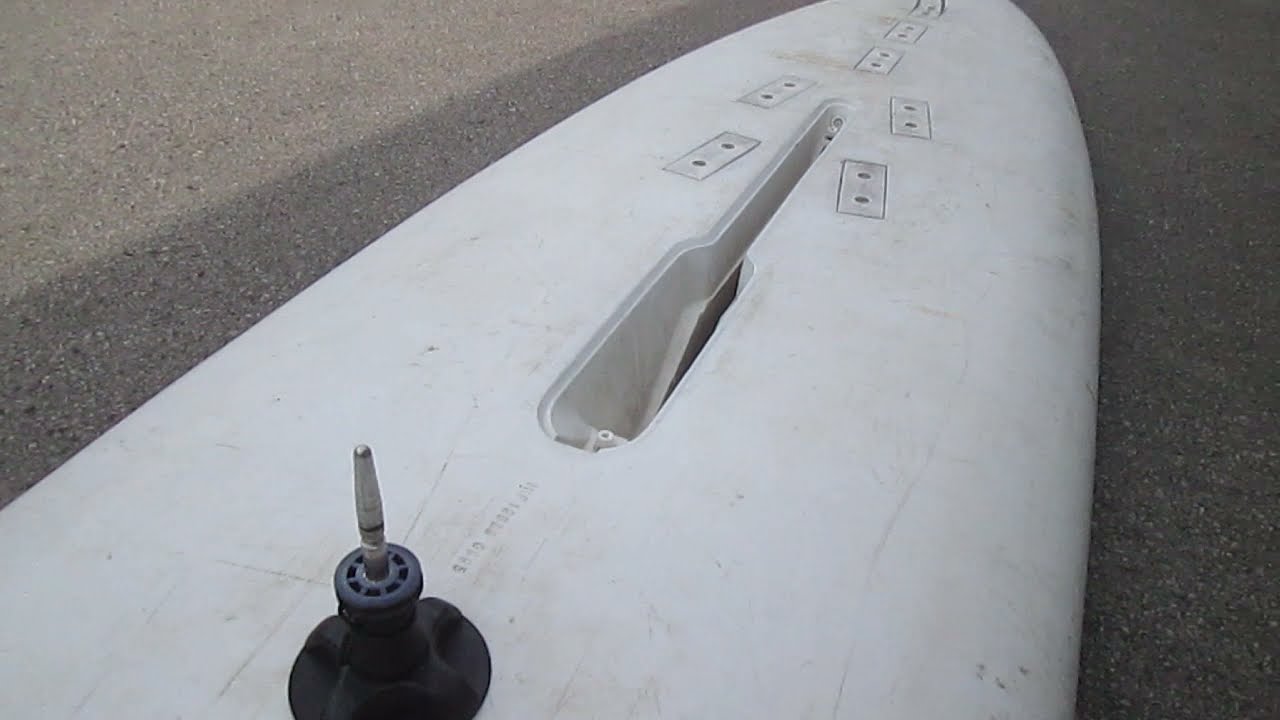 Modern boge joint mast base plate on an old windsurfing board