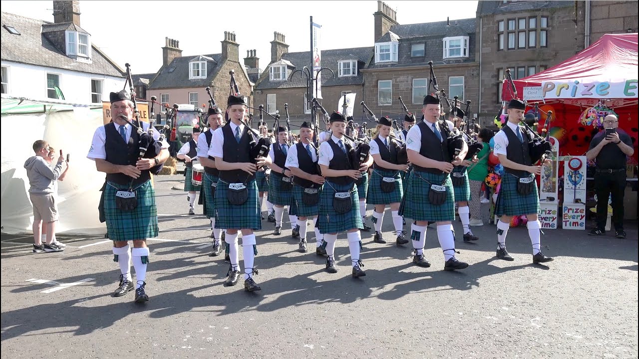 Newtonhill Pipe Band march in to start 2023 Stonehaven Feein' market in Aberdeenshire, Scotland