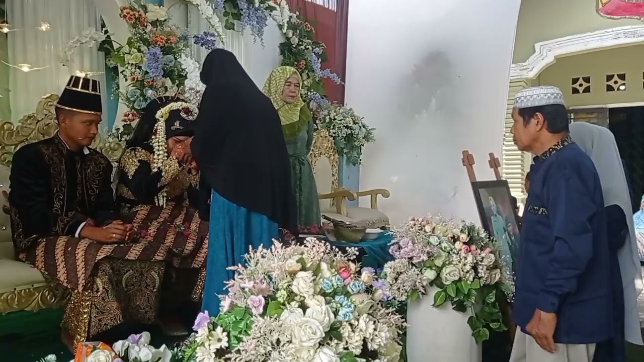 Acara Tepung Tawar pada acara pernikahan Romi dengan Afifah