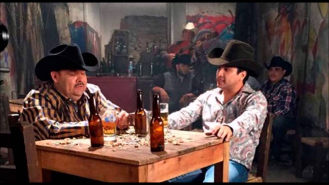 Julion Alvarez y Su Norteño Banda - El Guitarrero Ft. El Coyote