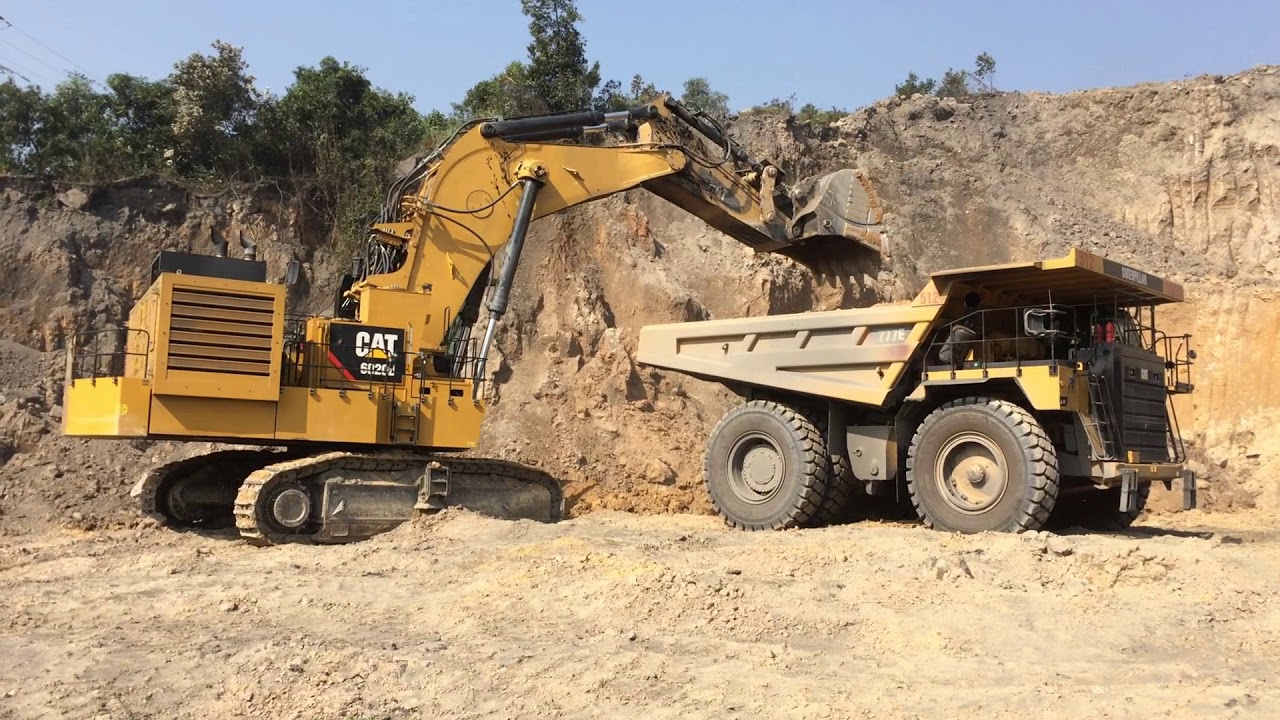 Cat 6020B - The Biggest Hydraulic Mining Shovels loading Cat 777E Off-Highway Trucks in Vietnam