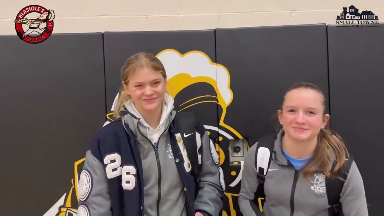 Rootstown's Colbie Curall, Elliott Smallfield & Coach Joe Leonard after their 70-45 win at Garfield