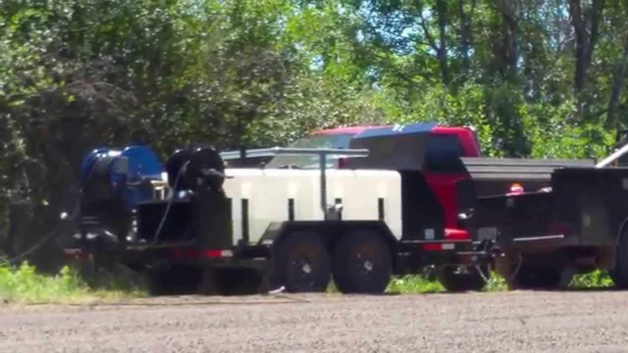 Jetter Trailer Eagle-600/3023 & WH-Warthog Clearing Soil & Rocks from a 36-inch Culvert!