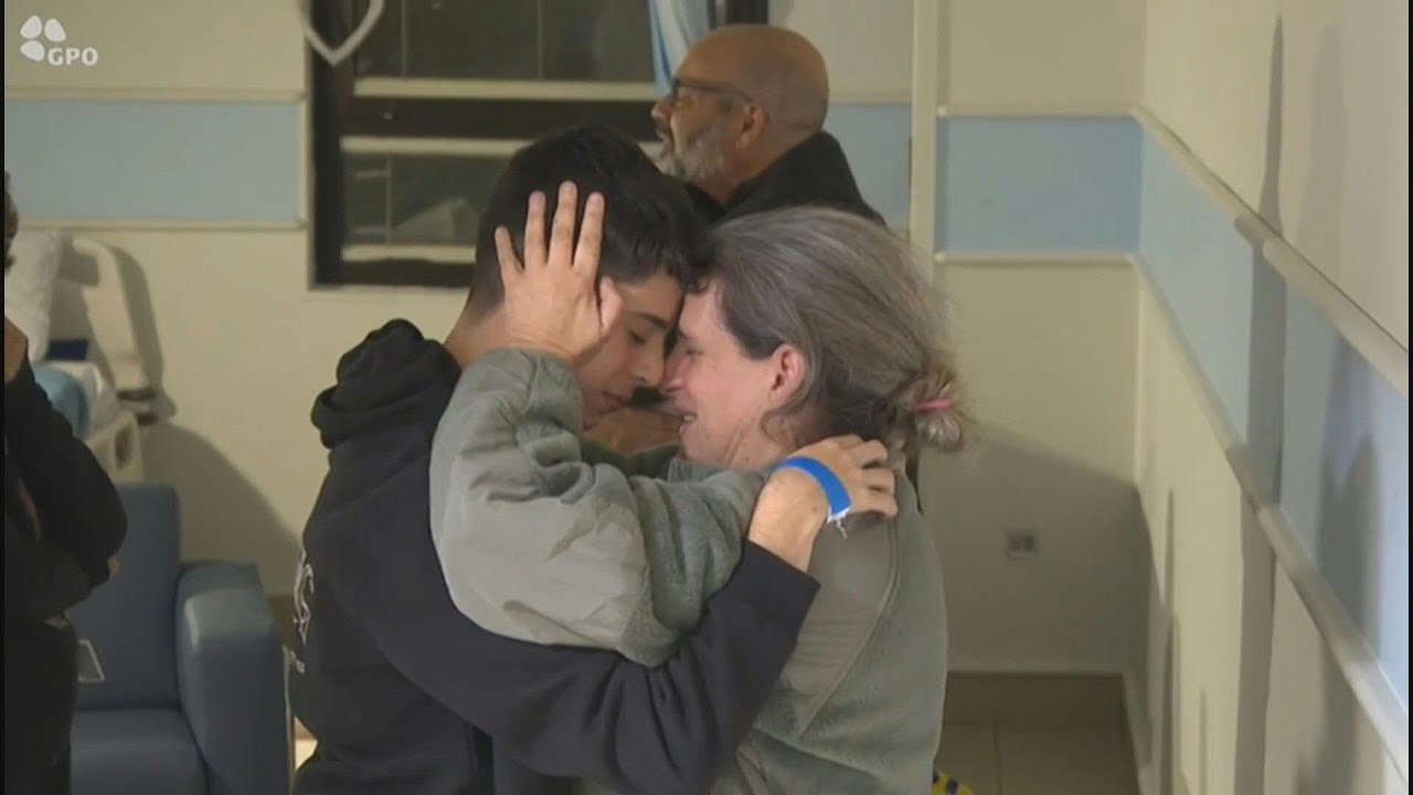 Freed Israeli mother and her 12-year-old daughter reunite with their family at Sheba hospital | AFP
