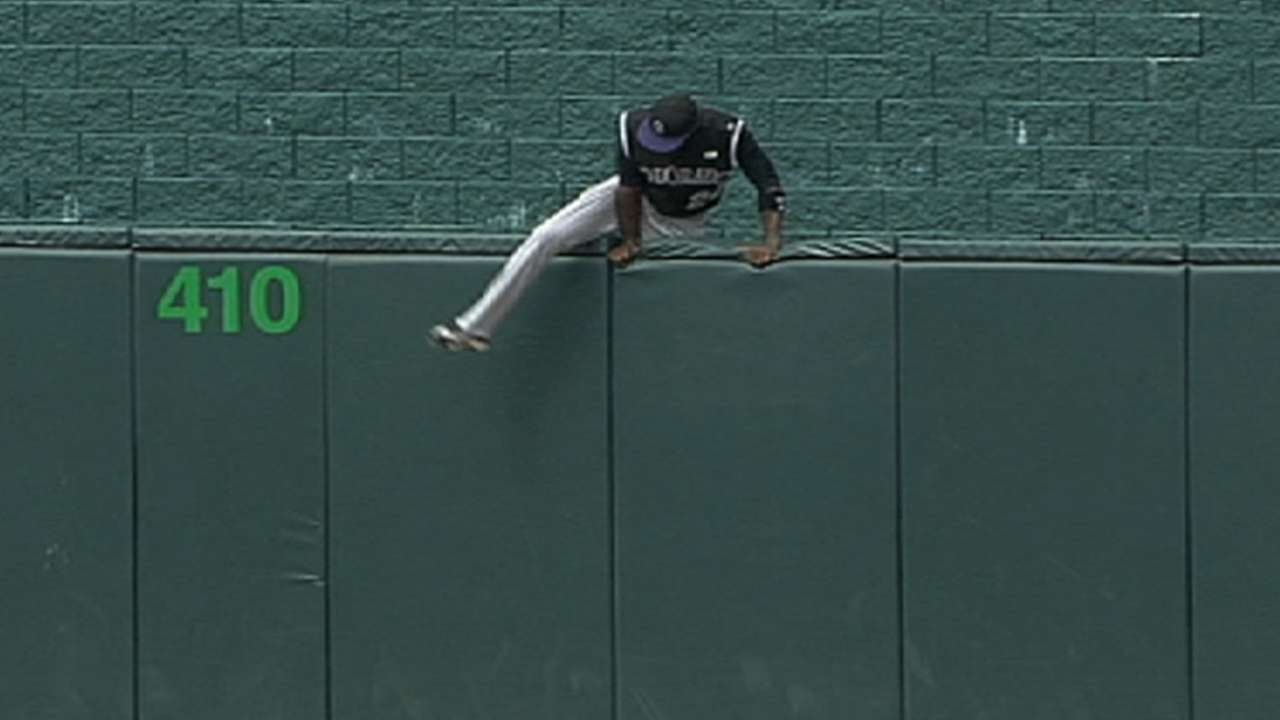 Fowler loses glove, hops fence to retrieve it