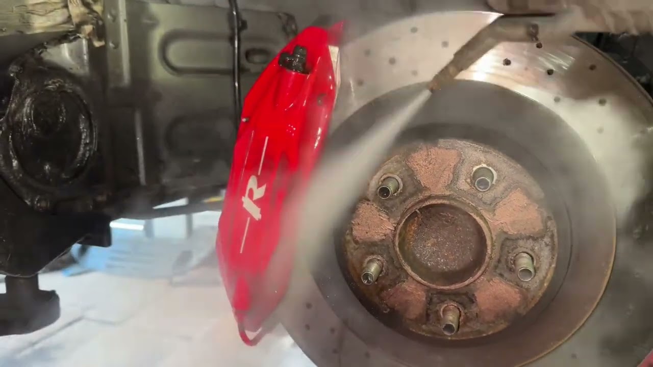 Jaguar XKR supercharged underbody detail - Rust treatment - Wax oyl