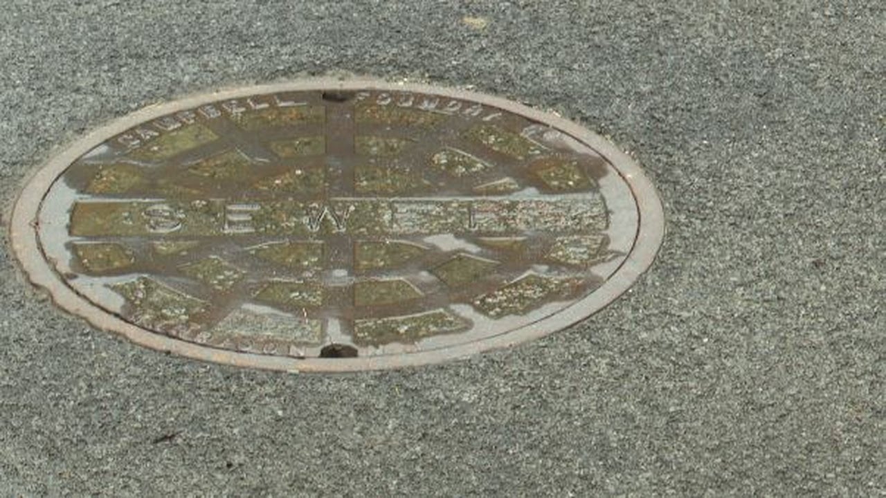 WWNY Grease blocks Potsdam pipes causing sewage backup on village streets