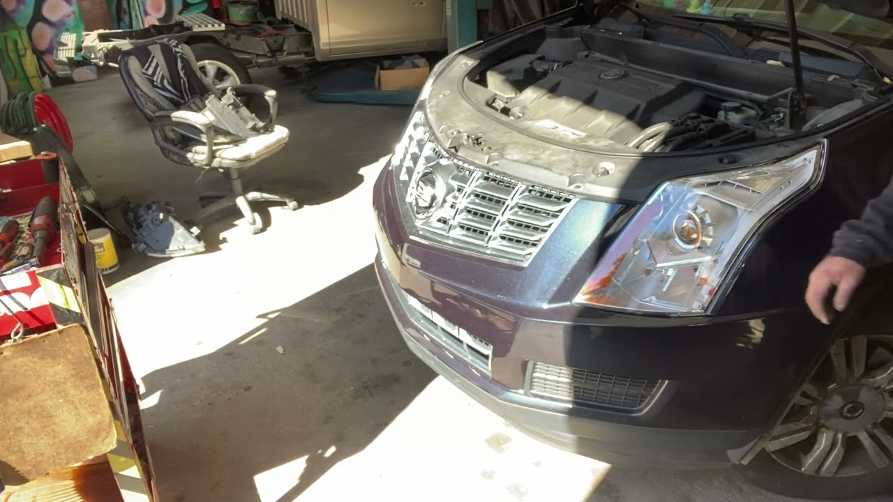 DIY 2015 Cadillac headlight replacement