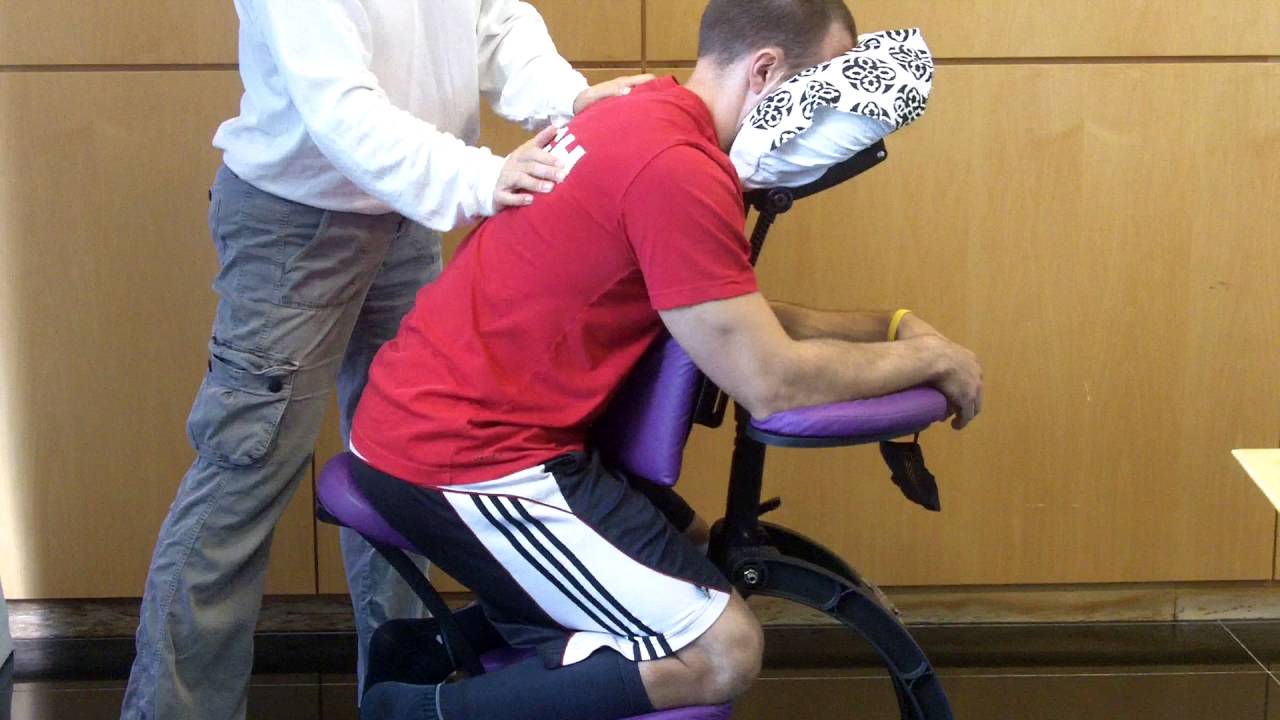 Mobile on-site chair massage by Massage Kneads to upper back, neck & shoulders!