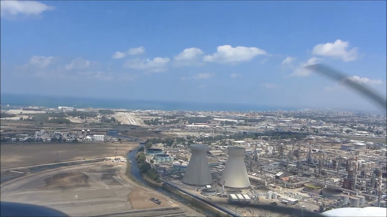 Haifa (LLHA) Day Light landing - You can see two chimneys along the RWY 34 approach